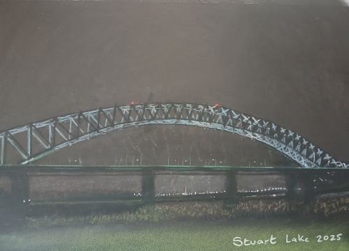 Runcorn Widnes bridge lit up after dark