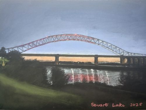 Silver Jubilee Bridge lit up at dusk