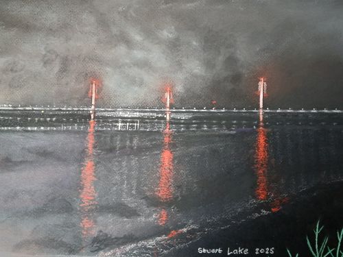 Mersey Gateway bridge lit up after dark