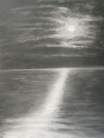 Moon showing through clouds